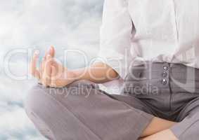 Woman Meditating by clouds