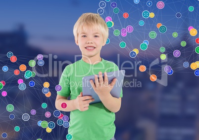 Boy with tablet against Night city with connectors