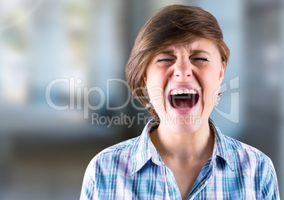 Stressed young woman shouting on street