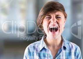 Stressed young woman shouting on street