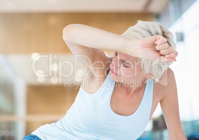 Distressed woman painful in large bright room
