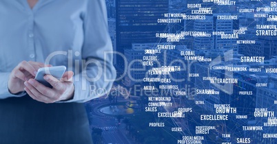 Woman touching phone against Night city with connectors