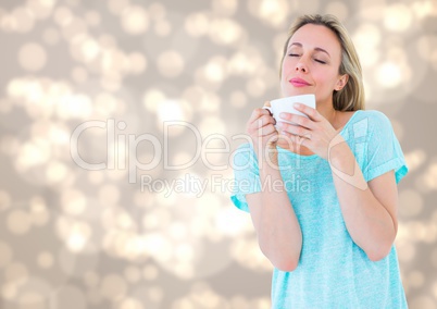 Woman with white mug against cream bokeh