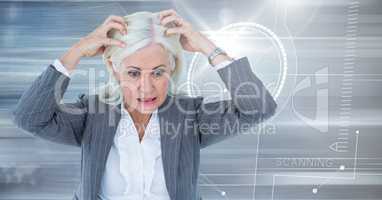 Stressed older woman with technology interface background
