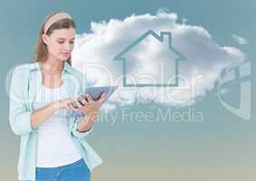 Woman with tablet against cloud with house