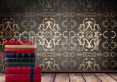 Books stacked by antique wallpaper decorative