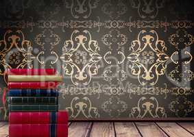 Books stacked by antique wallpaper decorative