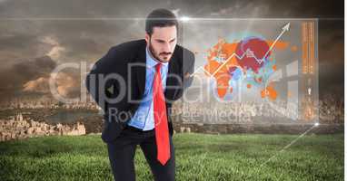 Businessman looking at interface of world map with City background