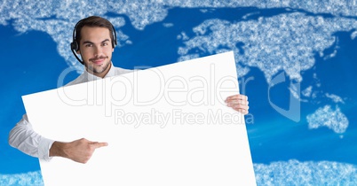 Travel agent with large blank card against map with clouds and blue background