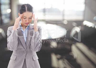 Stressed anxious woman near bright window