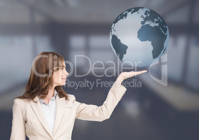 Woman with open palm hand under world earth globe