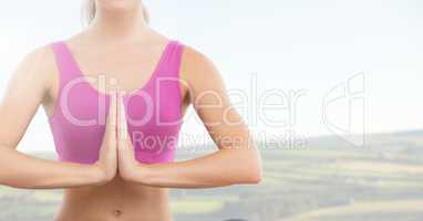 Woman Meditating with bright background