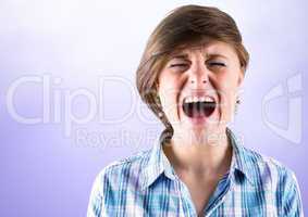 Stressed young woman shouting with purple background