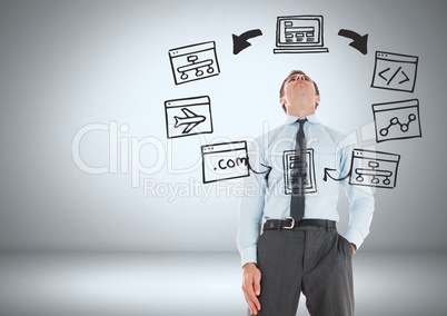 Businessman with computer screens graphics drawings
