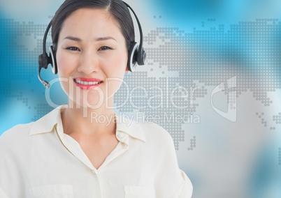 Travel agent with headset against map with blue background