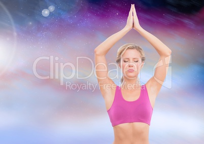 Woman yoga Meditating with purple clouds