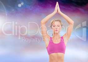 Woman yoga Meditating with purple clouds