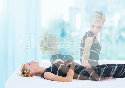 Woman Meditating astral projection out of body experience by window