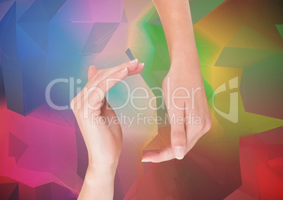 Hands reaching eachoter against abstract background