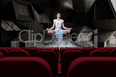 Young woman meditating in air in 3d room with empty cinema  seats