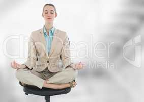 Businesswoman Meditating with bright background