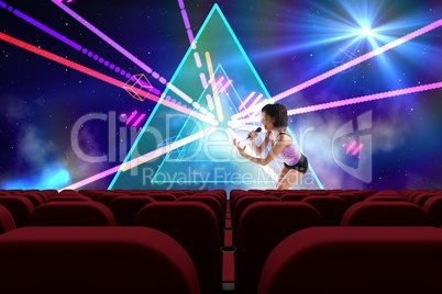 singer performing  in front of 3d empty cinema