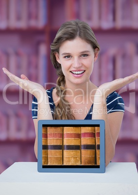 Woman at table with tablet showing books against blurry bookshelf with pink overlay