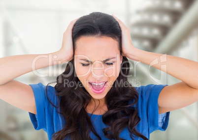 Stressed woman by stairs