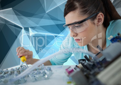Woman with electronics against blue geometric background