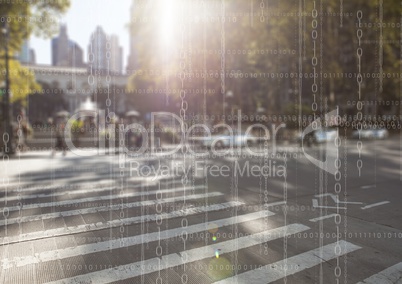White binary code against blurry street with flare