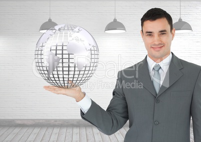 Man with open palm hand holding globe of world earth