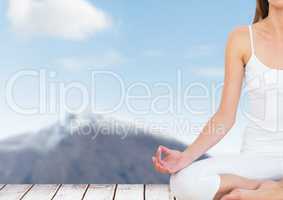 Woman Meditating in mountains
