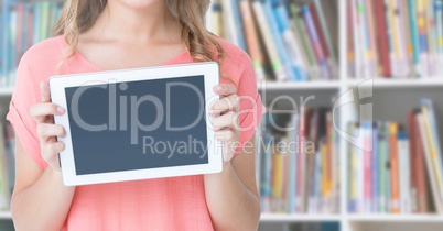 Woman hands holding tablet in Library