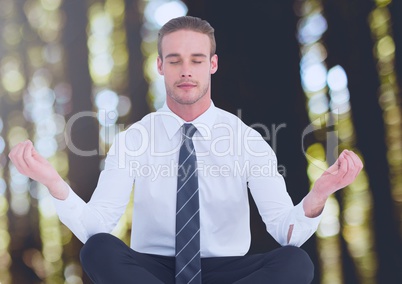 Man Meditating peaceful in woods