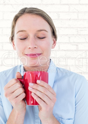 Close up of woman with red mug against white brick wall