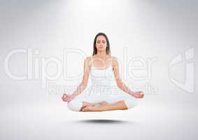 Woman Meditating floating against grey background