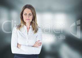 Upset stressed businesswoman against blurred background