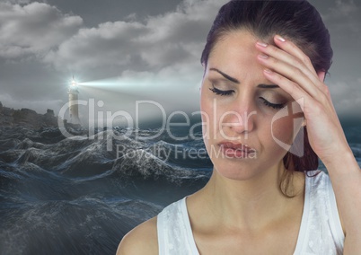 Stressed upset woman next to hopeful lighthouse