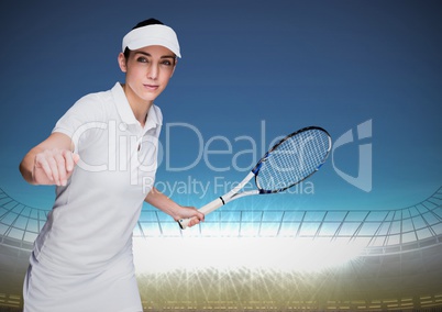 Tennis player in stadium with bright lights and blue sky
