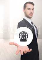 Open palm businessman hand with globe world person user icon