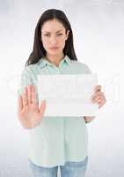 Woman with blank card holding out hand against white background