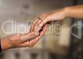 Wedding engaged couple holding hands with blurred background