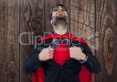 Business Superhero against wood