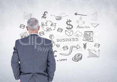 Businessman with business graphics drawings