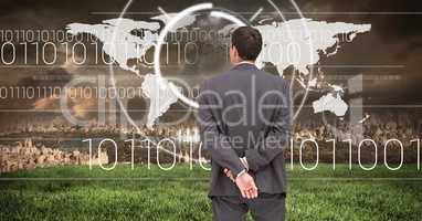 Businessman looking at City with world map interface
