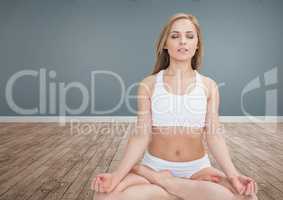Woman Meditating in room