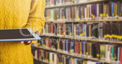 Woman on tablet in Library