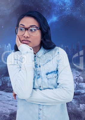 Worried pondering woman against starry night sky