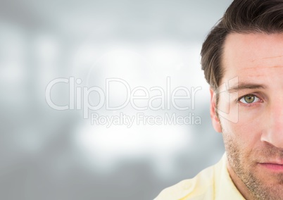 Sad depressed mans face against blurred background