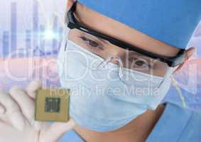Close up of masked woman with electronics against purple and peach background with graphs
